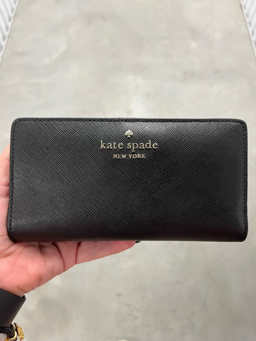 kate spade staci black leather slim bifold wallet with gold logo